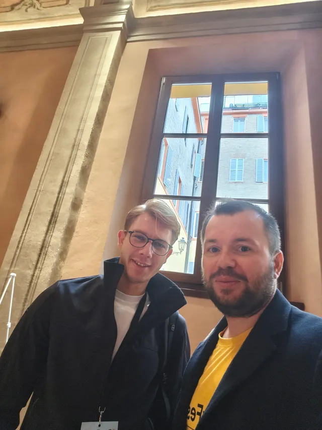 Meeting a fellow participant at DevFest Modena